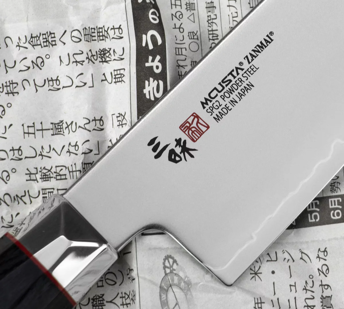 Mcusta Zanmai Revolution Nóż Santoku 15 cm ze stali SPG2 — zdjęcie 3