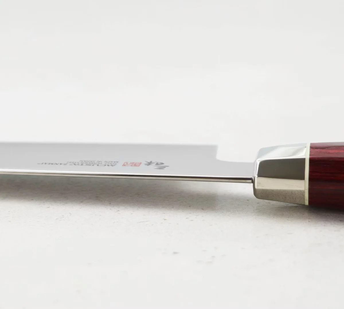 Mcusta Zanmai Red Revolution SPG2 Nóż Santoku 18 cm — zdjęcie 10