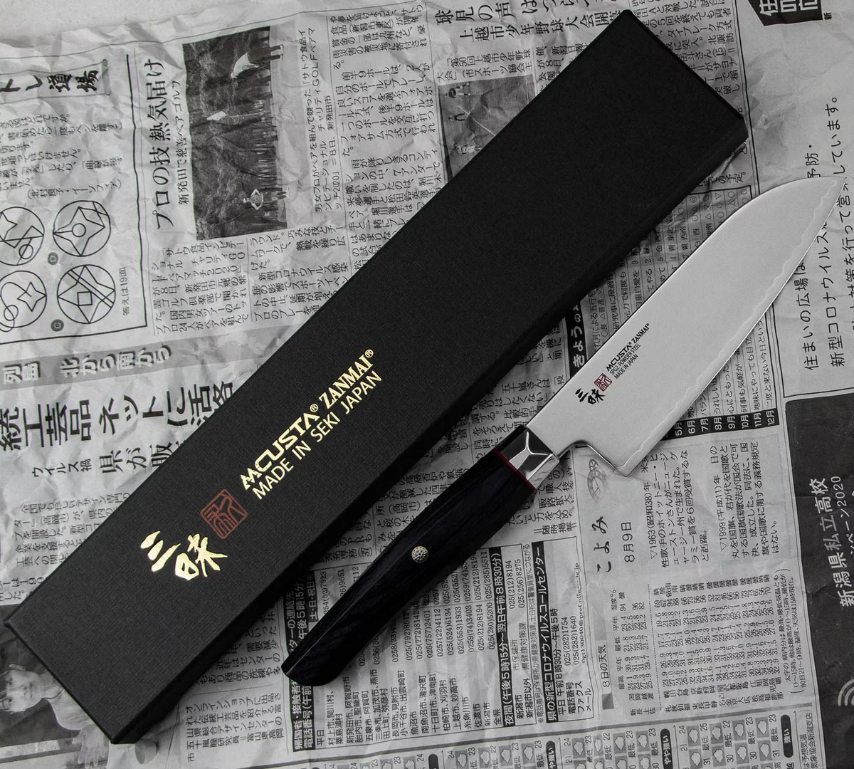 Mcusta Zanmai Revolution Nóż Santoku 15 cm ze stali SPG2 — zdjęcie 5